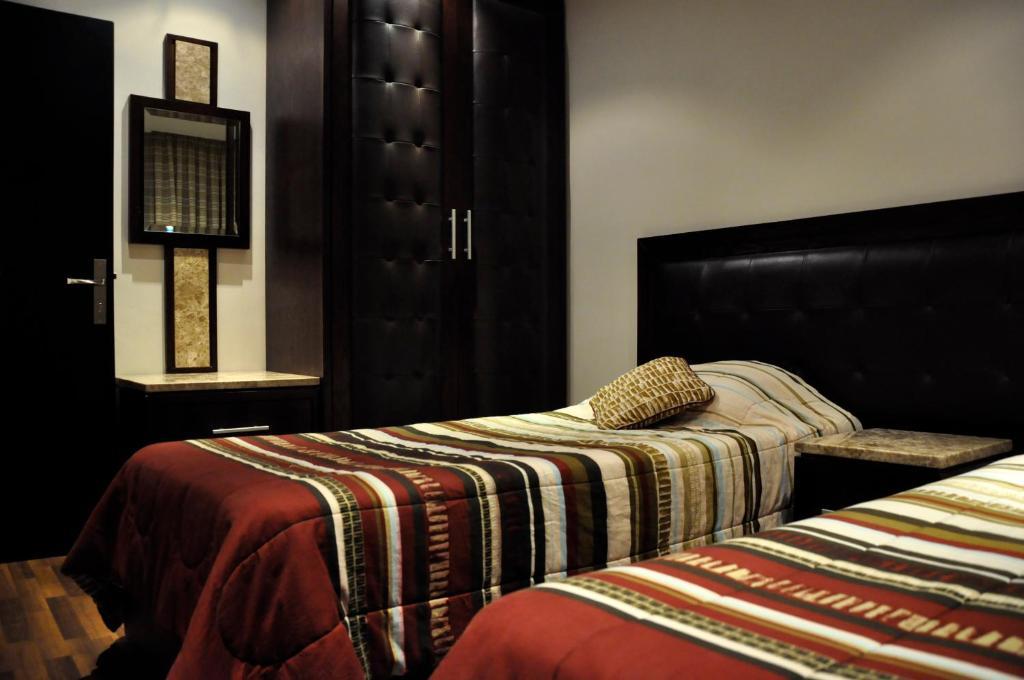 Granada Suites Hotel Amman Zimmer foto